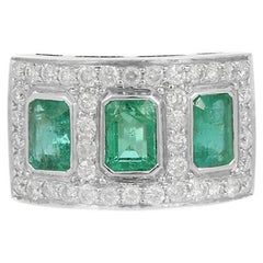 Three Stone Emerald Ring With Diamond in 18K White Gold