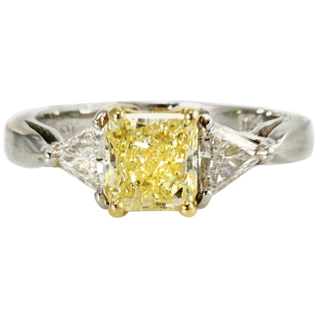 Three-Stone Fancy Yellow Diamond Engagement Ring in Platinum