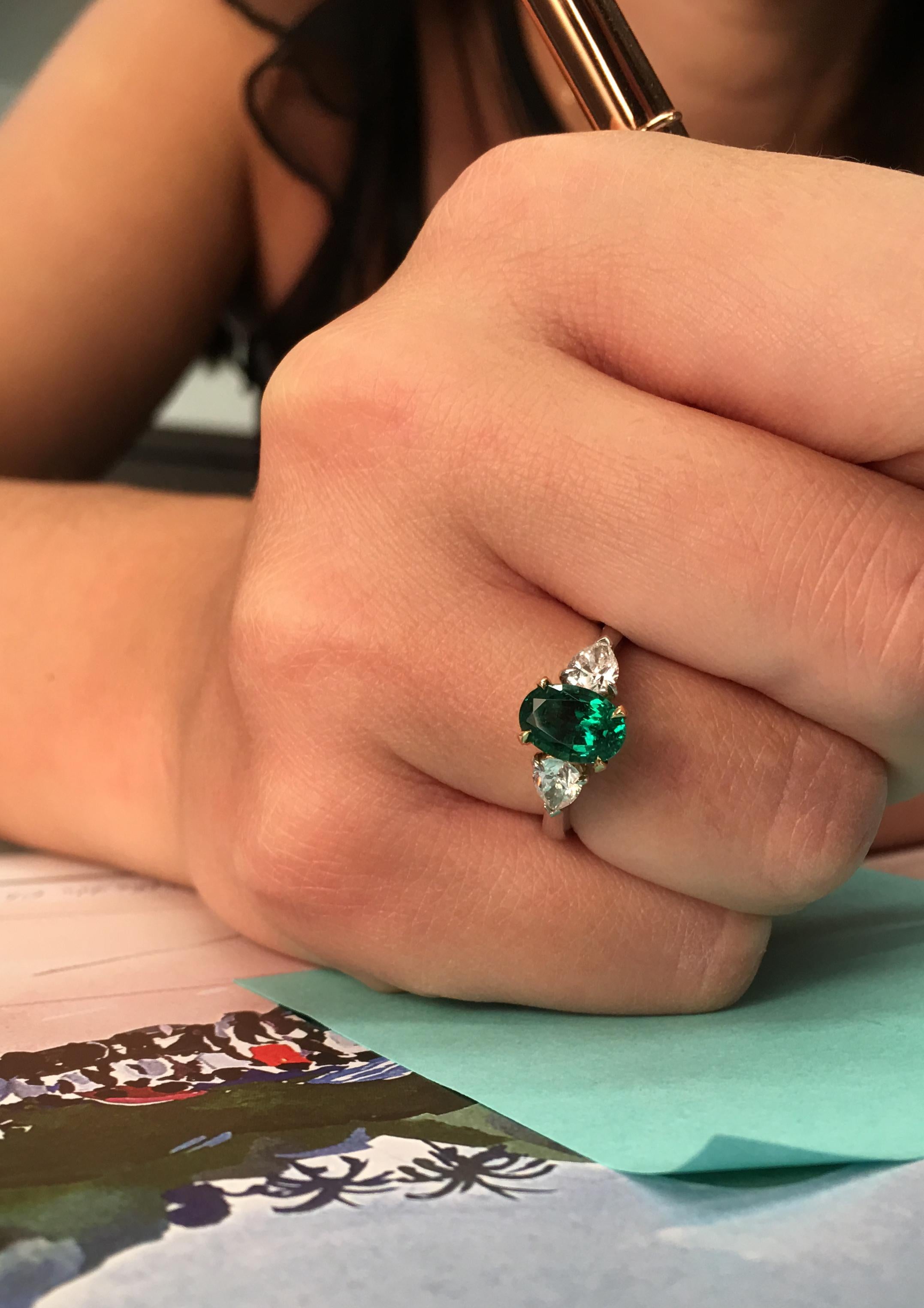 emerald green engagement ring