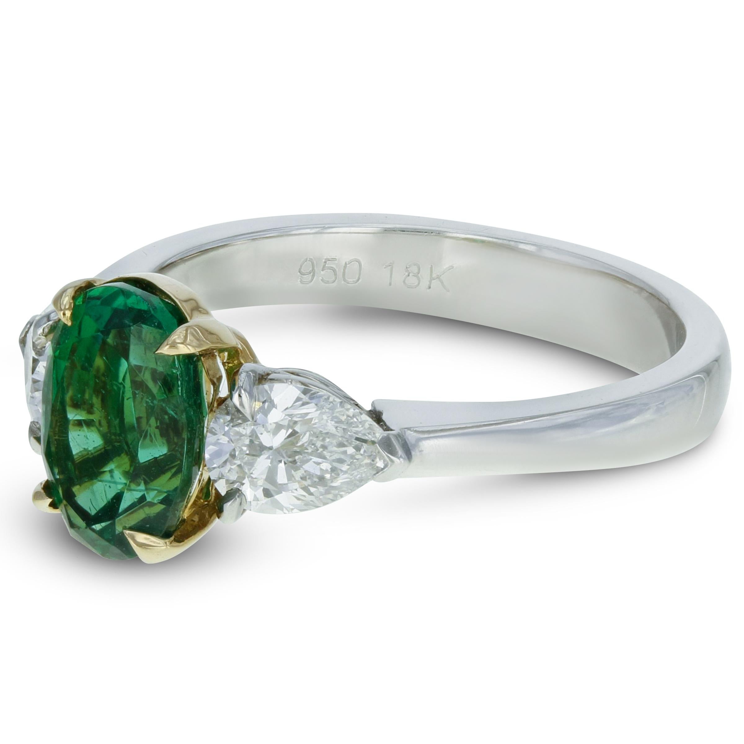 green emerald engagement ring