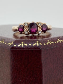 Three-Stone Half Hoop 0.85ct Thai Ruby & Diamond Retro Ring in 9K Rose Gold.