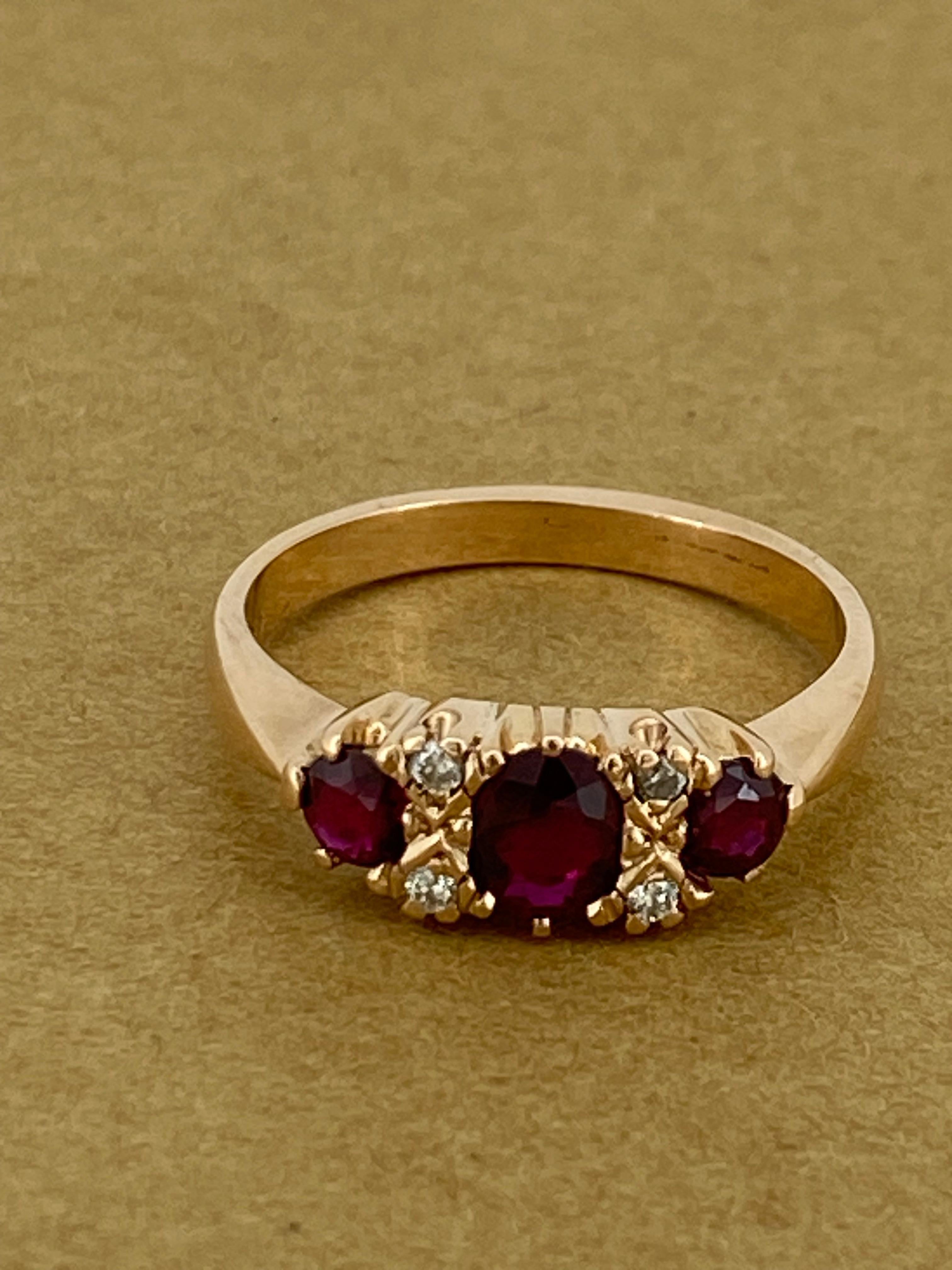Women's Three-Stone Half Hoop 0.85ct Thai Ruby & Diamond Retro Ring in 9K Rose Gold.