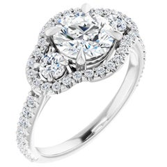 Three-Stone Halo GIA Round Brilliant White Diamond Engagement Ring 1.50 Carats