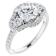 Three-Stone Halo GIA Round Brilliant White Diamond Engagement Ring 1.50 Carats