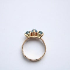 Three Stone Montana Sapphire in 14 Karat Yellow Gold