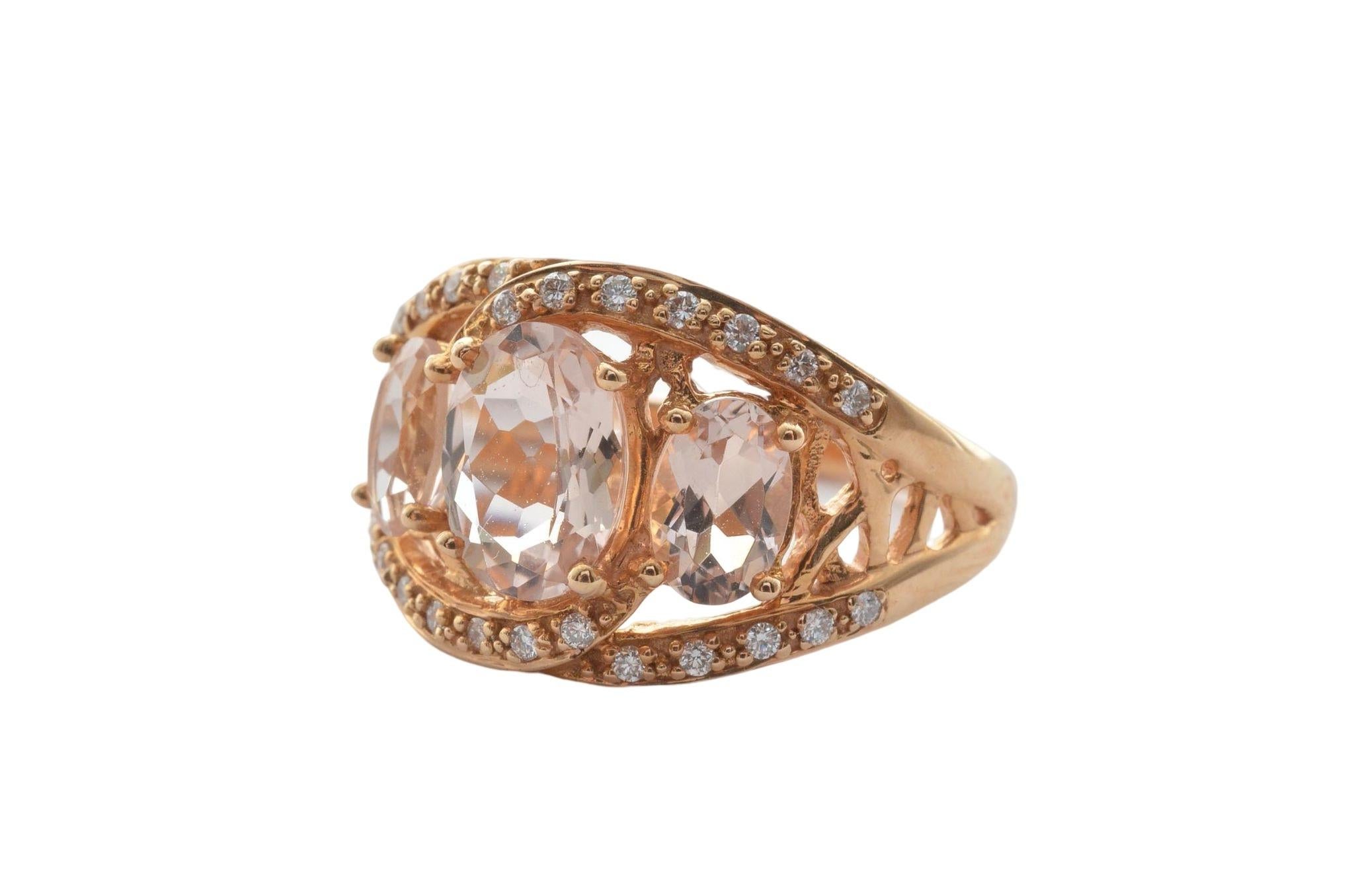 Oval Cut Three Stone Morganite and Diamond Ring in 18 Karat Rose Gold For Sale