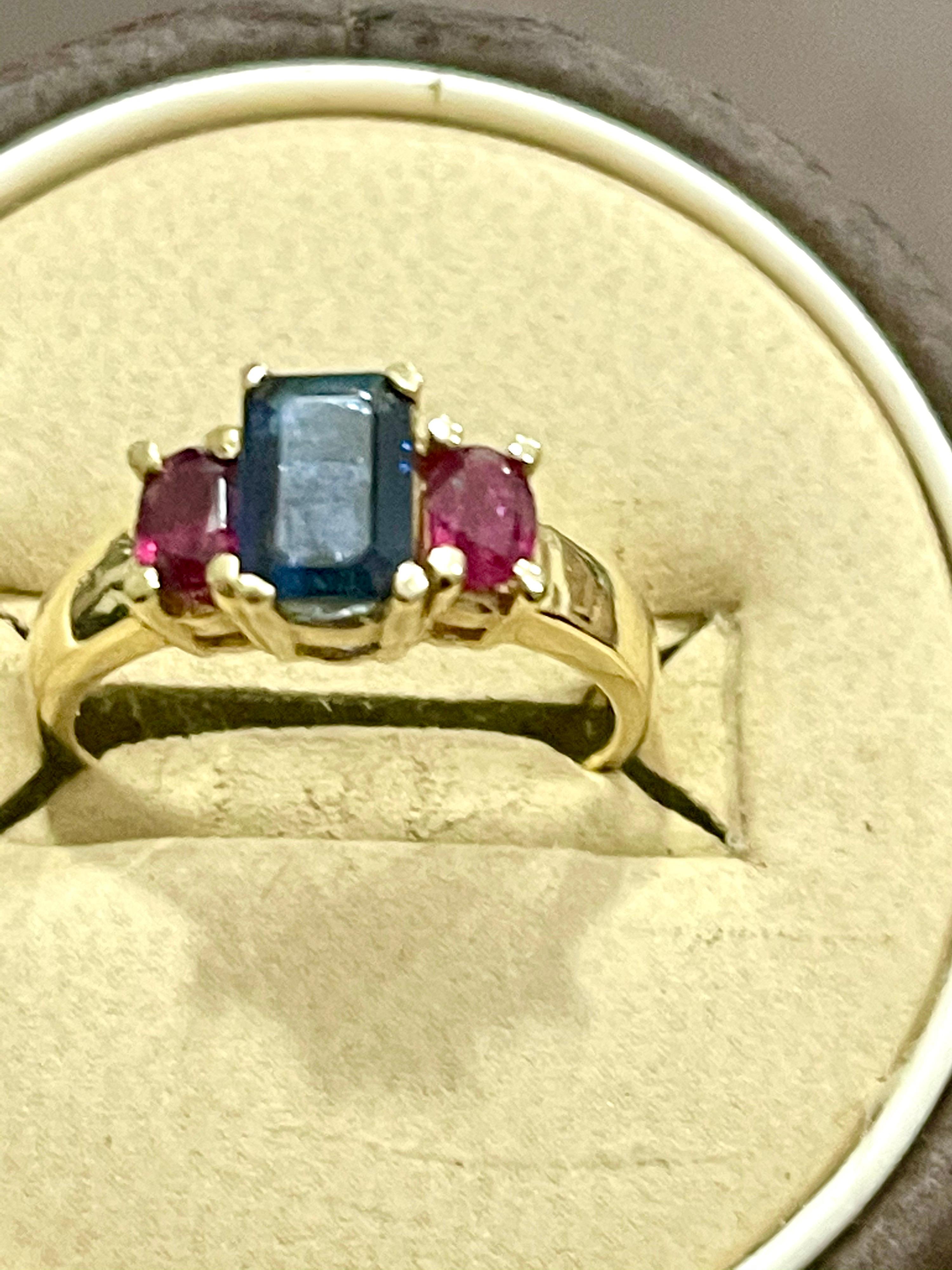 Women's Three-Stone Natural Blue Sapphire and Ruby Engagement Ring in 14 Karat Gold
