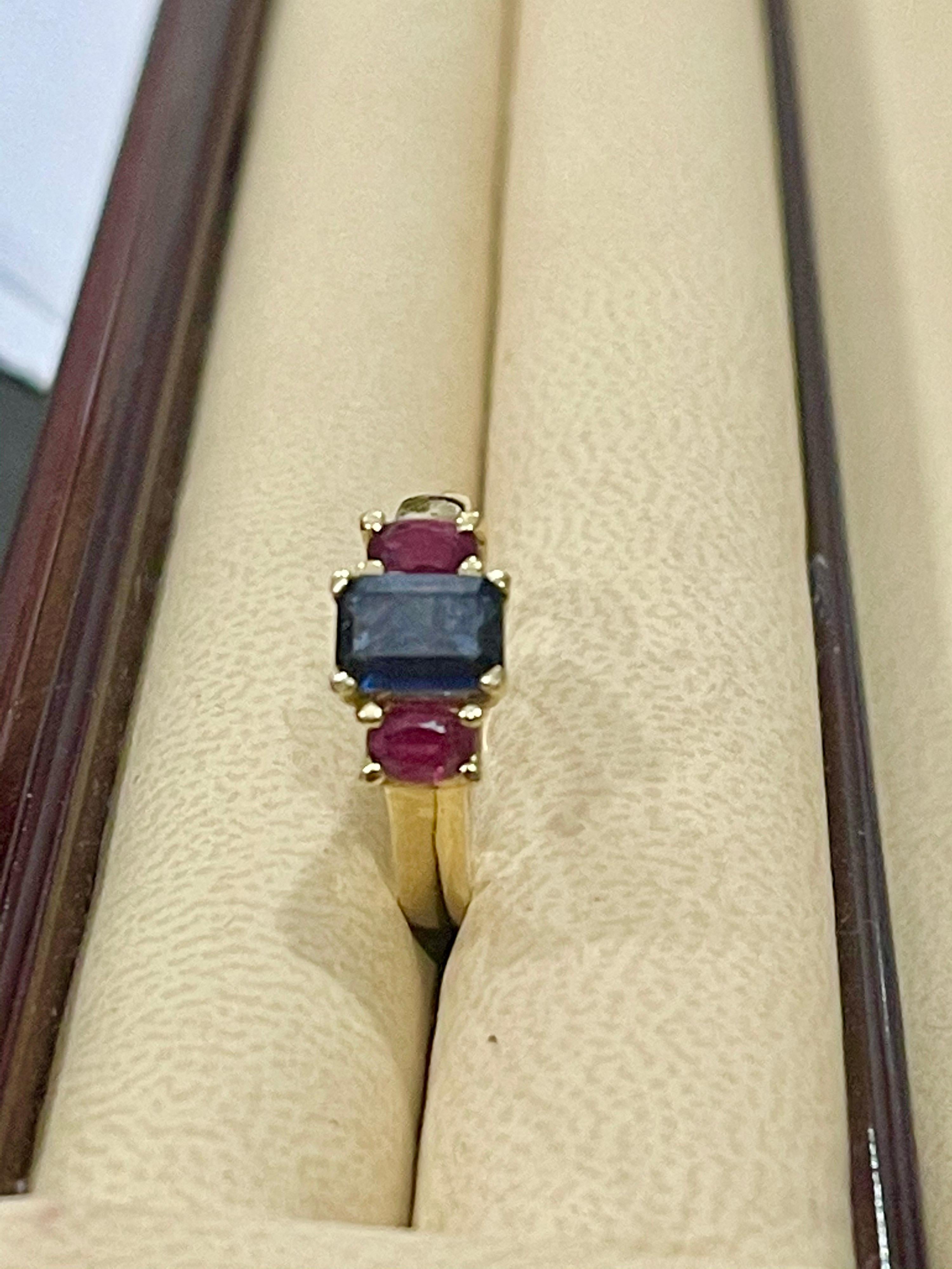 Three-Stone Natural Blue Sapphire and Ruby Engagement Ring in 14 Karat Gold 1