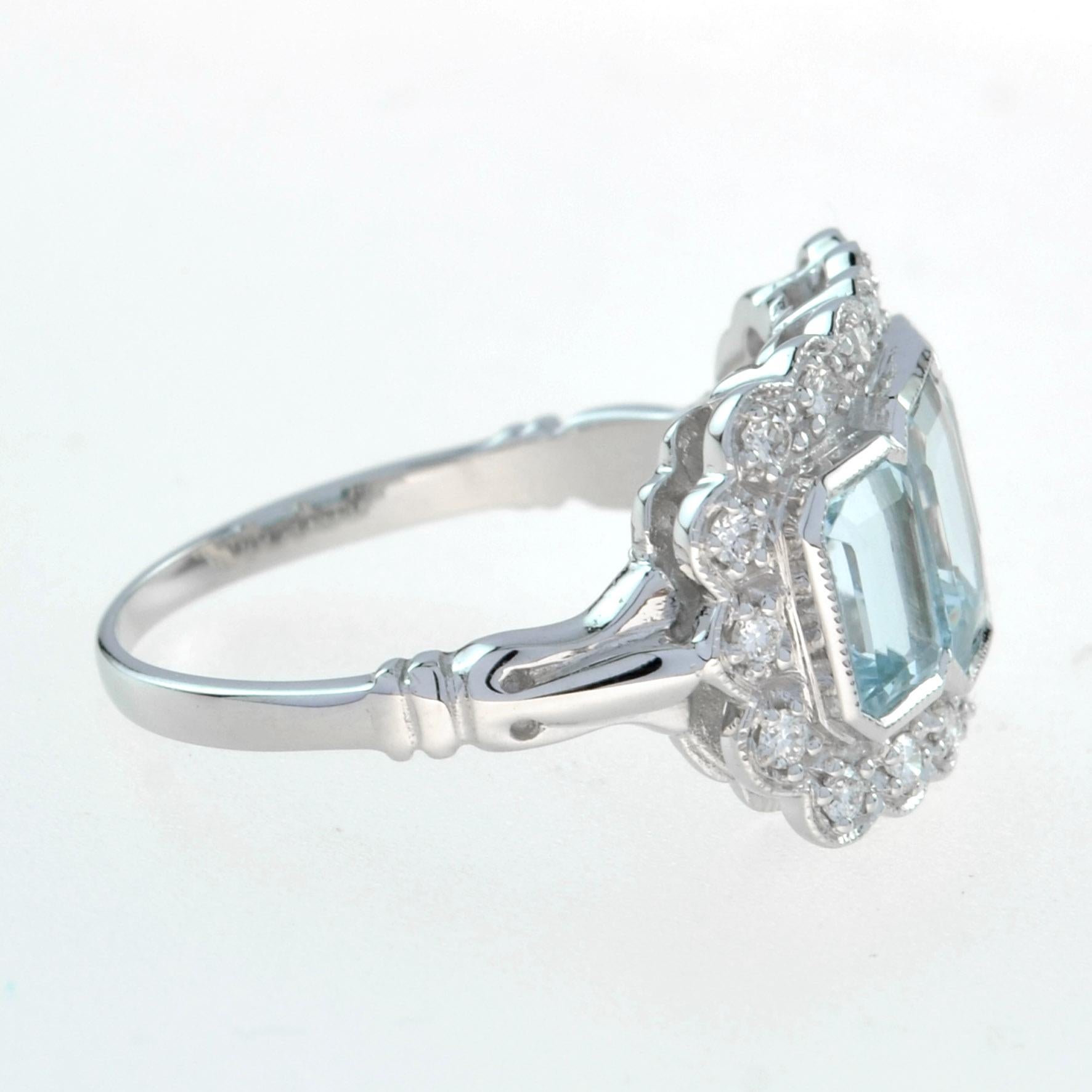 Art déco Bague à trois pierres en forme d'octogone, taille émeraude, aigue-marine bleue, diamant, halo en platine en vente