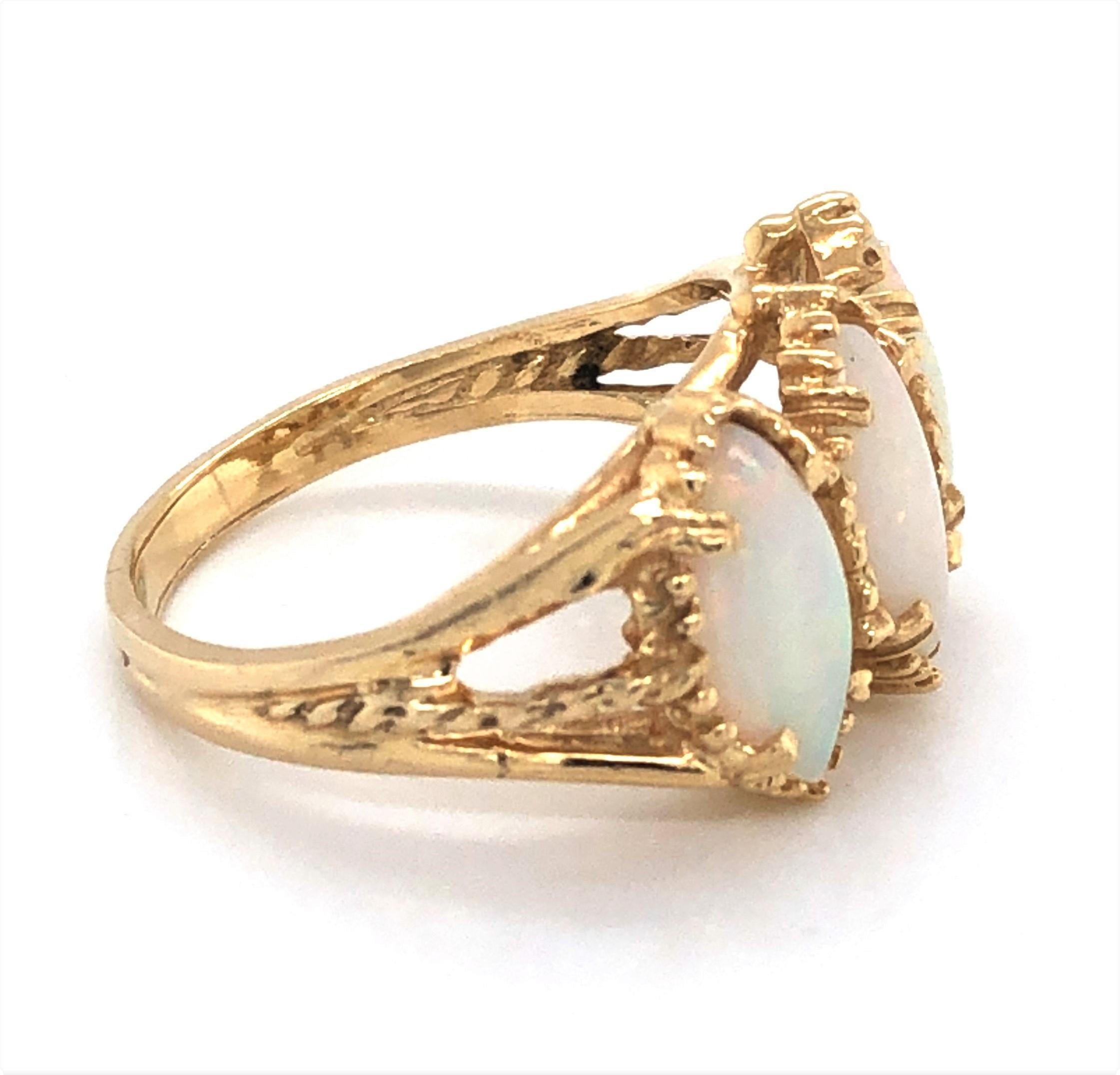 3 stone opal gold ring