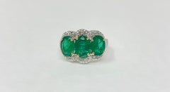 Three-Stone Oval Emerald and Diamond Ring in 18 Karat White Gold