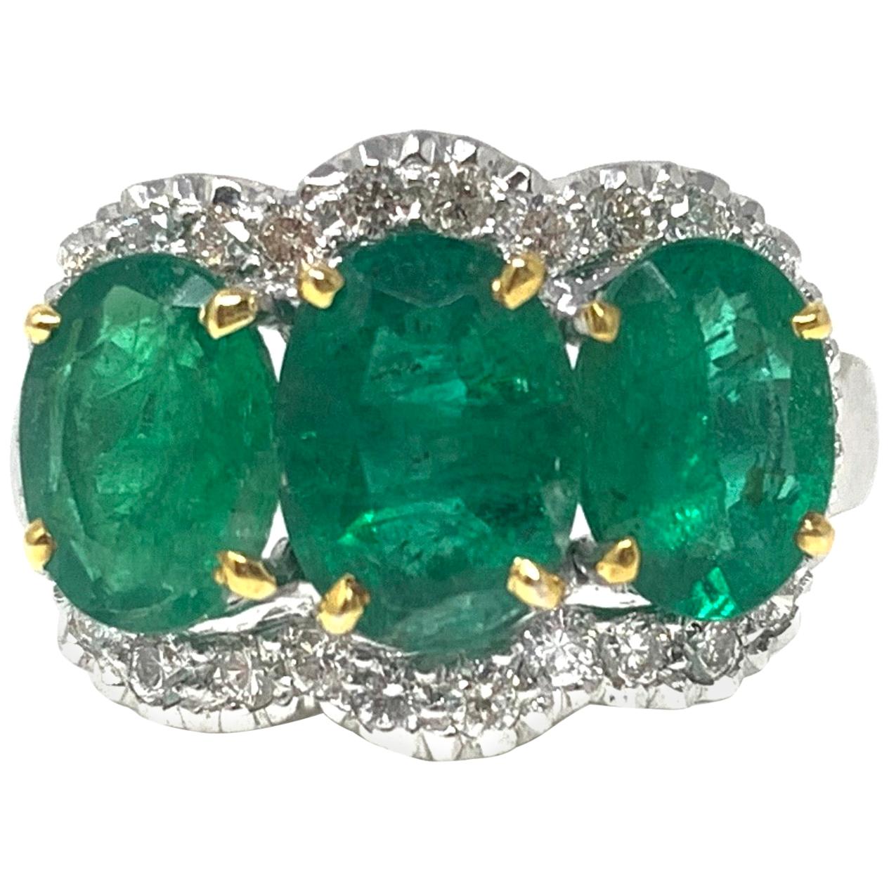 Three-Stone Oval Emerald and Diamond Ring in 18 Karat White Gold