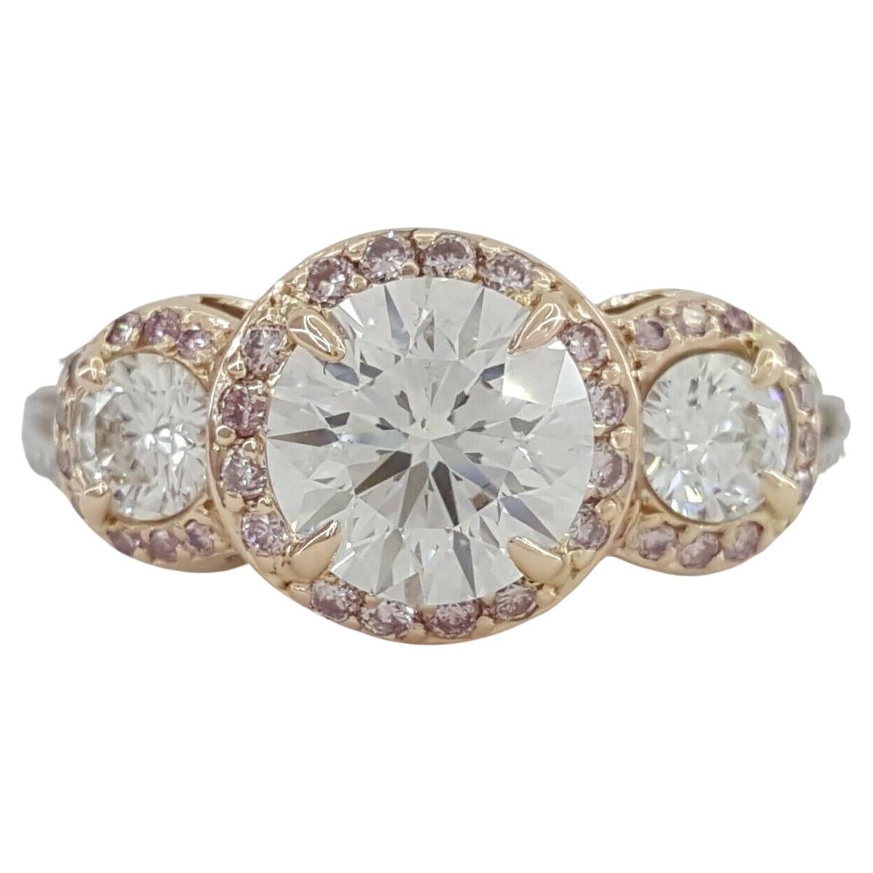 Three Stone Platinum and 18K Rose Gold Forever 10 Diamond Engagement