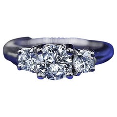 Three-Stone Platinum Engagement Ring with 1.00ct Center Round Diamond