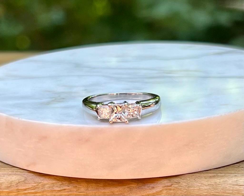 princess cut three stone diamond engagement rings