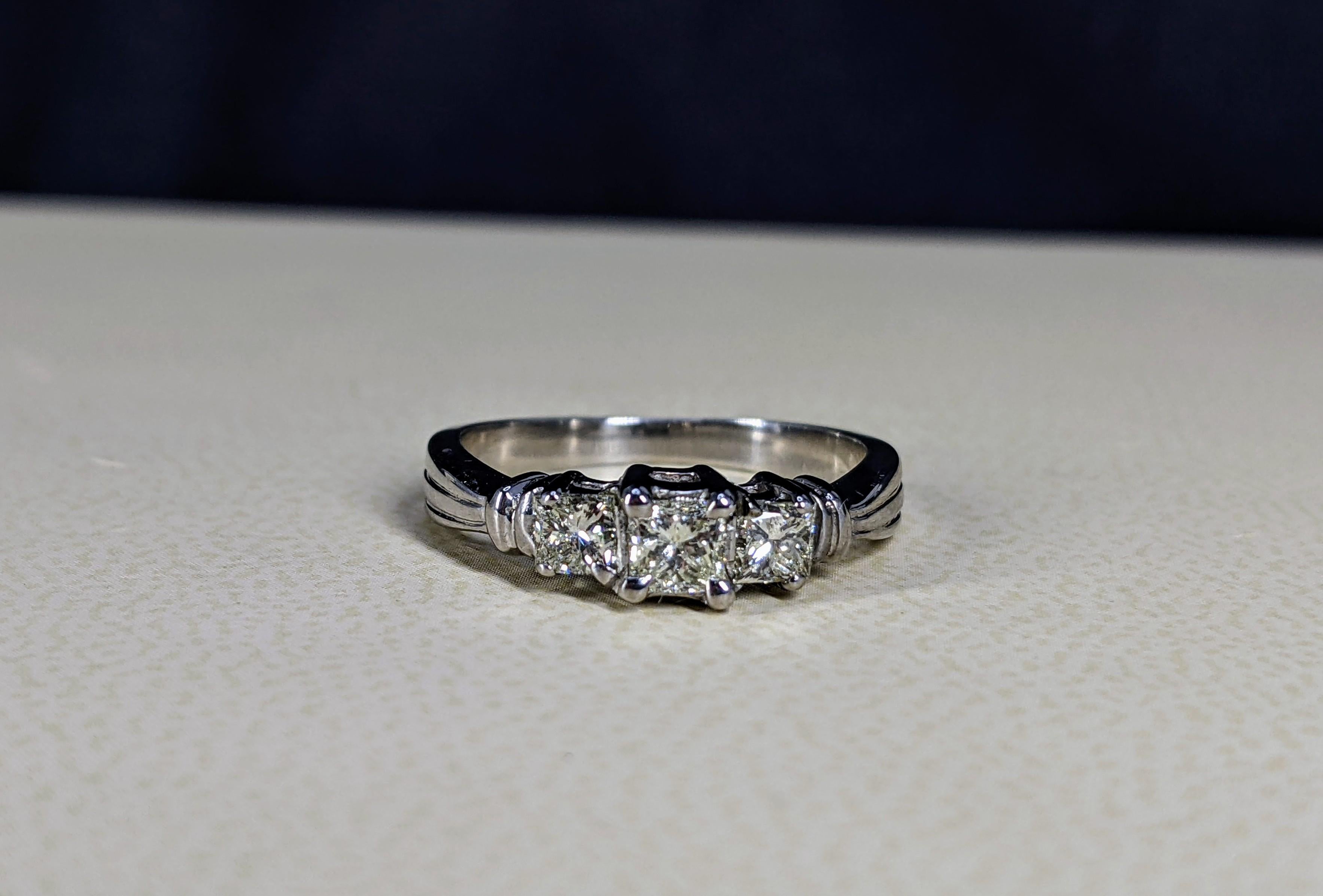 For Sale:  Three Stone Princess Cut Diamond Ring 0.55 Ct. Tw. 4