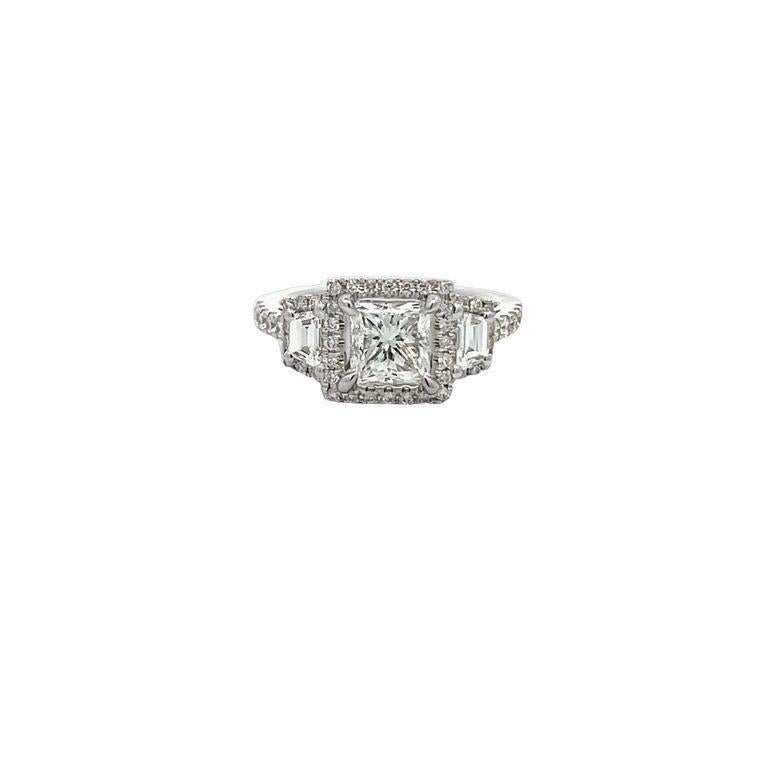 Get ready to be blown away by the breathtaking beauty of this three-stone ring! Featuring a stunning princess-shaped fancy diamond, this ring boasts a center stone weighing an impressive 1.52 carats, this stone is H color in SI1 clarity GIA