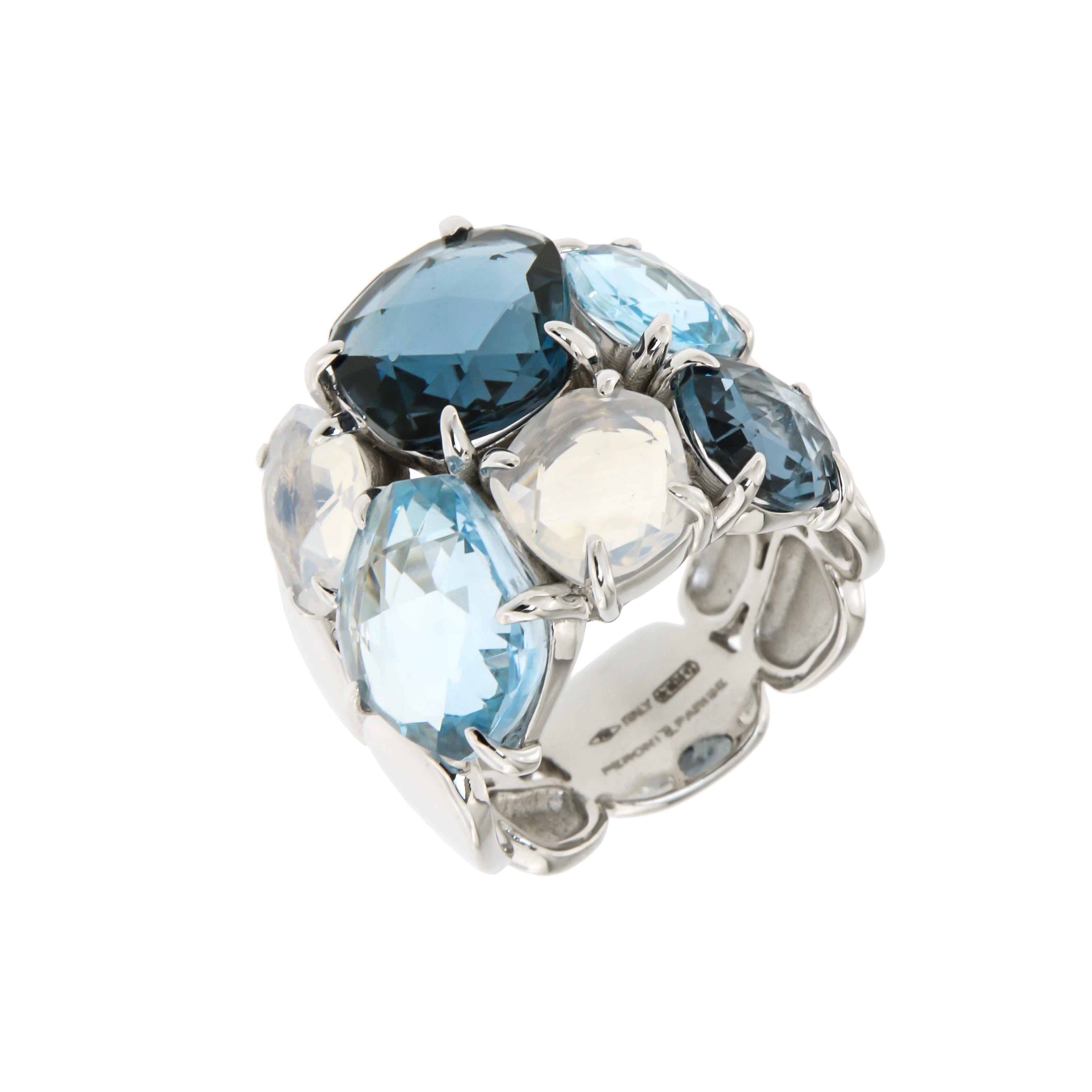 Ring White Gold 18 K
London Blue Topaz 
Sky Blue Topaz
Quartz

Weight 12,4 grams
Size 14

With a heritage of ancient fine Swiss jewelry traditions, NATKINA is a Geneva based jewellery brand, which creates modern jewellery masterpieces suitable for
