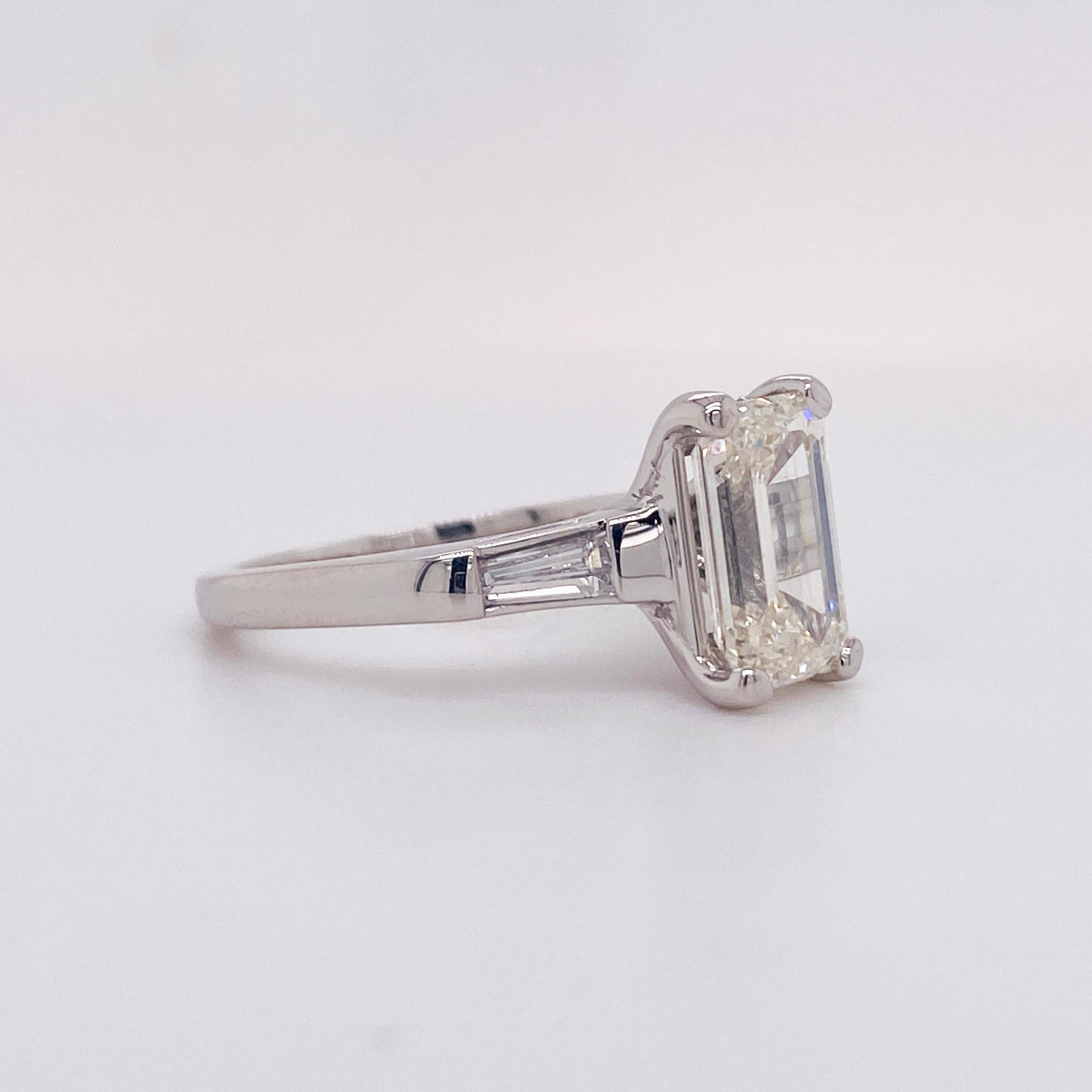 For Sale:  Emerald Cut Diamond Platinum Ring 2.50 Carats Flanked with Baguette Dias Lv 4