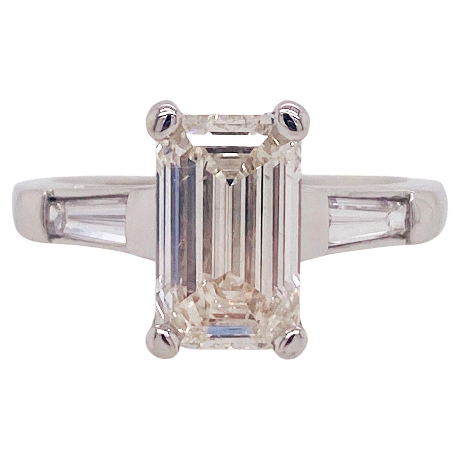 For Sale:  Emerald Cut Diamond Platinum Ring 2.50 Carats Flanked with Baguette Dias Lv
