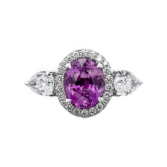 Three-Stone Ring with 2.20 Carat Oval Pink Sapphire