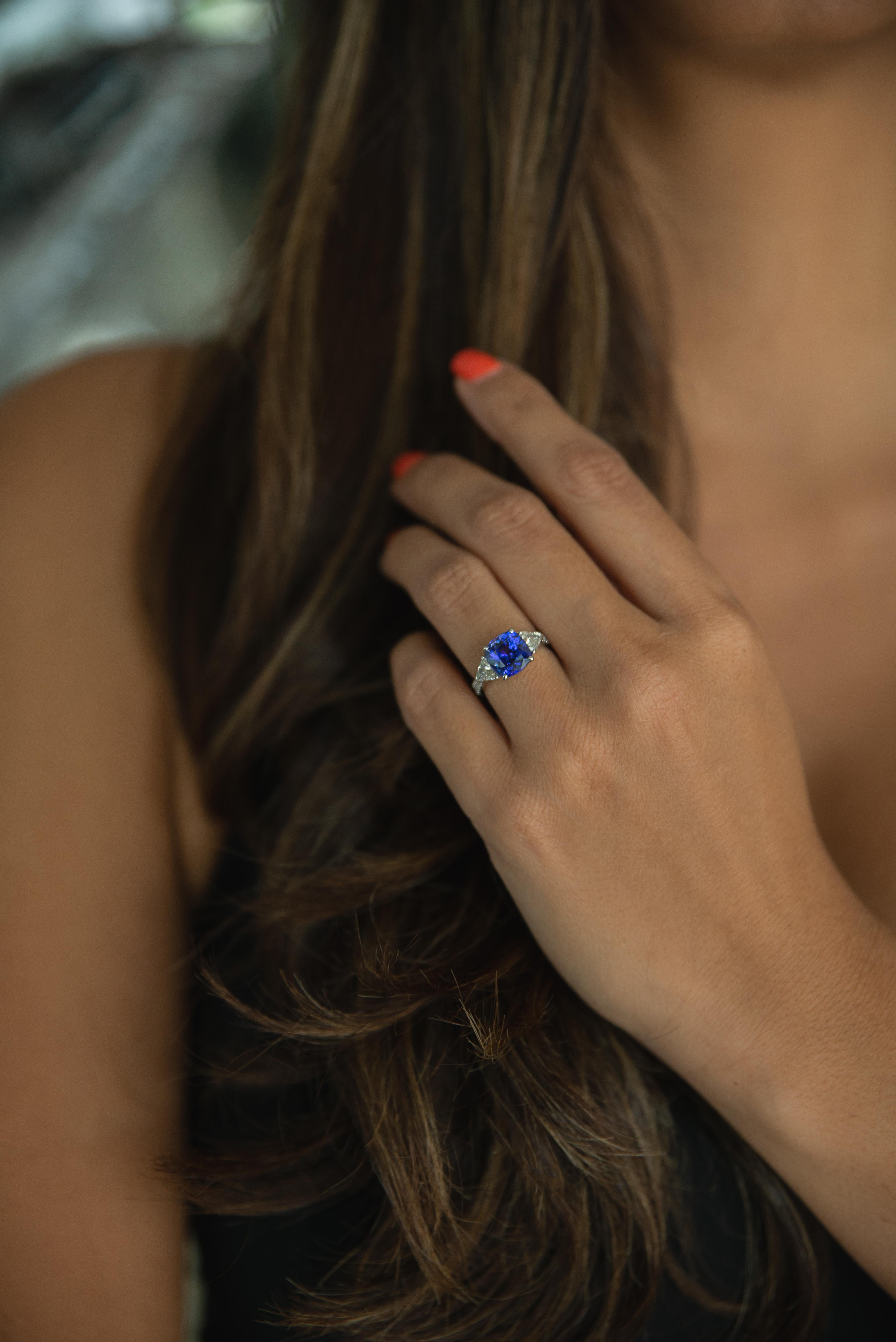 Women's Three-Stone Ring with 3.62 Carat Tanzanite and Trillion Cut Diamonds