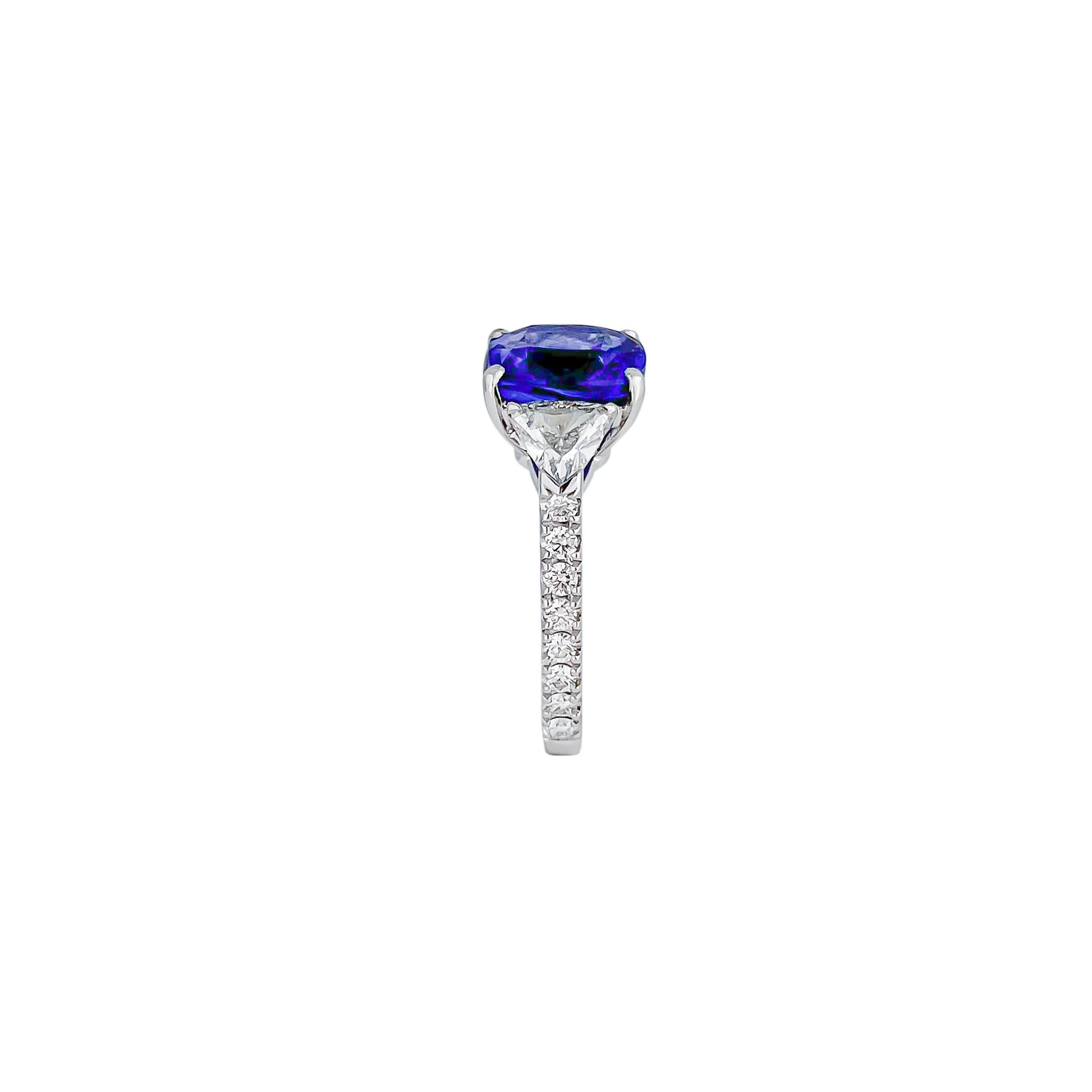 Modern Three-Stone Ring with 3.62 Carat Tanzanite and Trillion Cut Diamonds