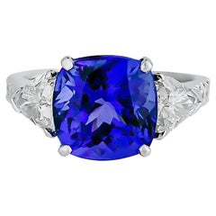 Three-Stone Ring with 3.62 Carat Tanzanite and Trillion Cut Diamonds