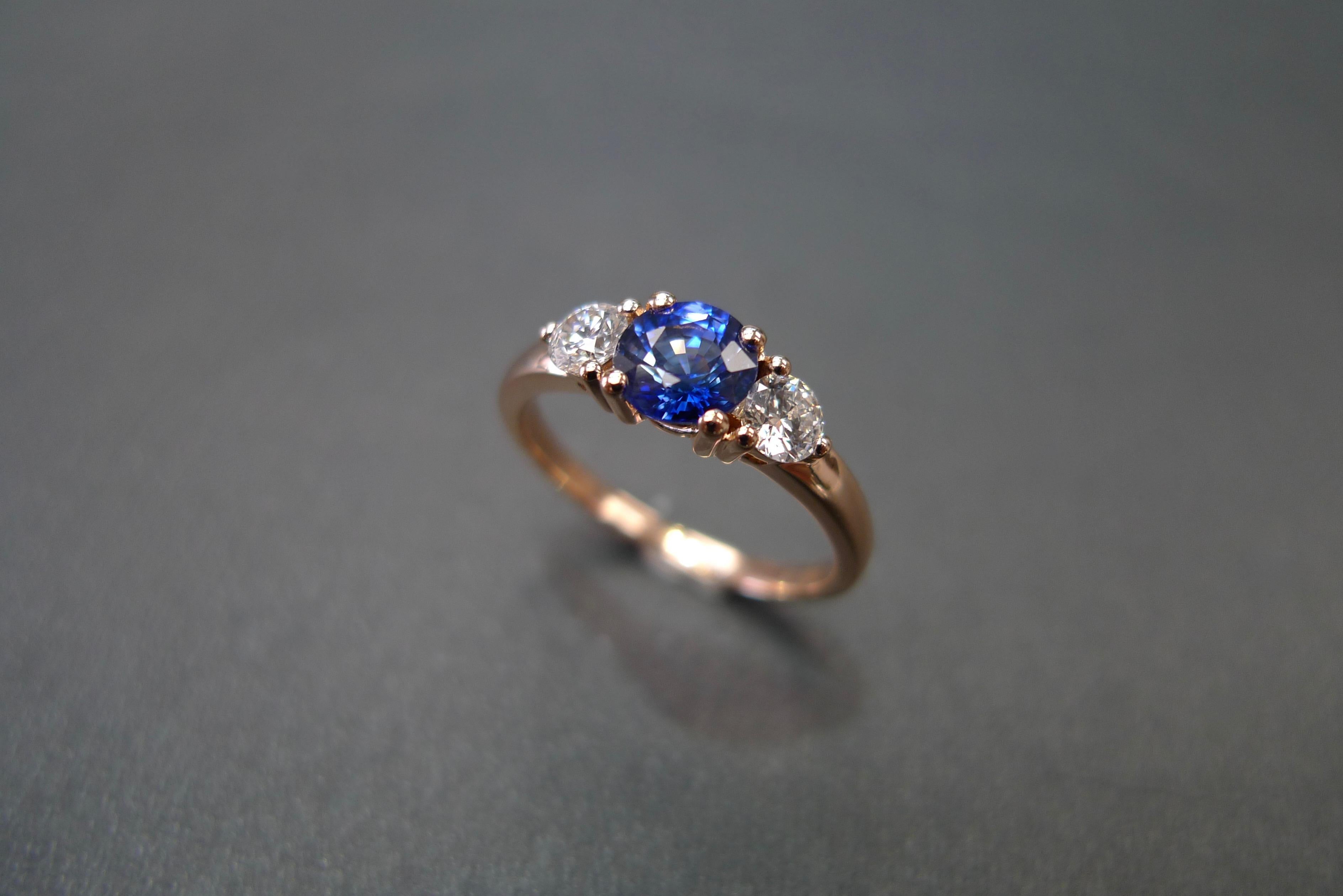 For Sale:  Three-Stone Ring with Blue Sapphire and Round Brilliant Cut Diamond in Rose Gold 2