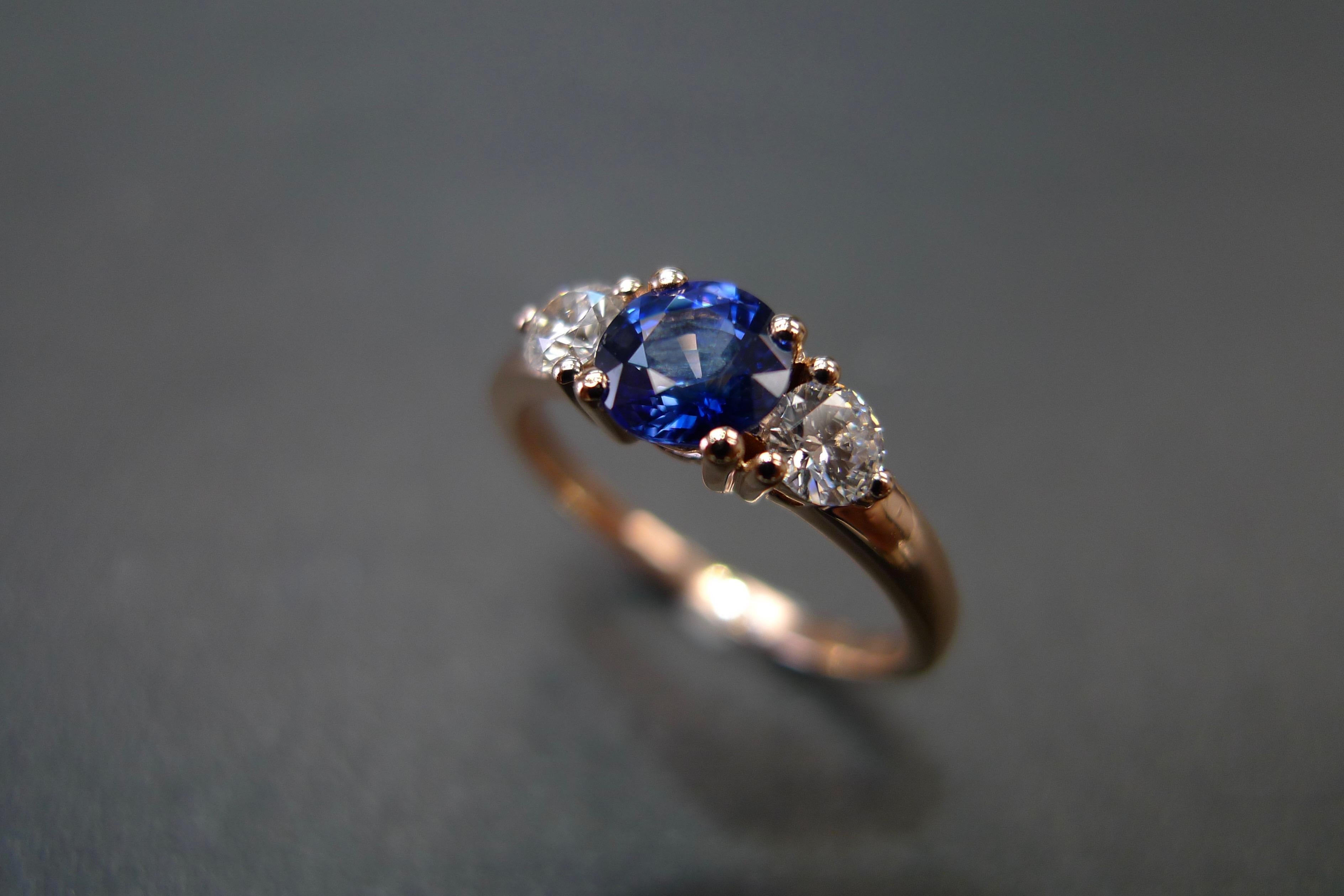 For Sale:  Three-Stone Ring with Blue Sapphire and Round Brilliant Cut Diamond in Rose Gold 4