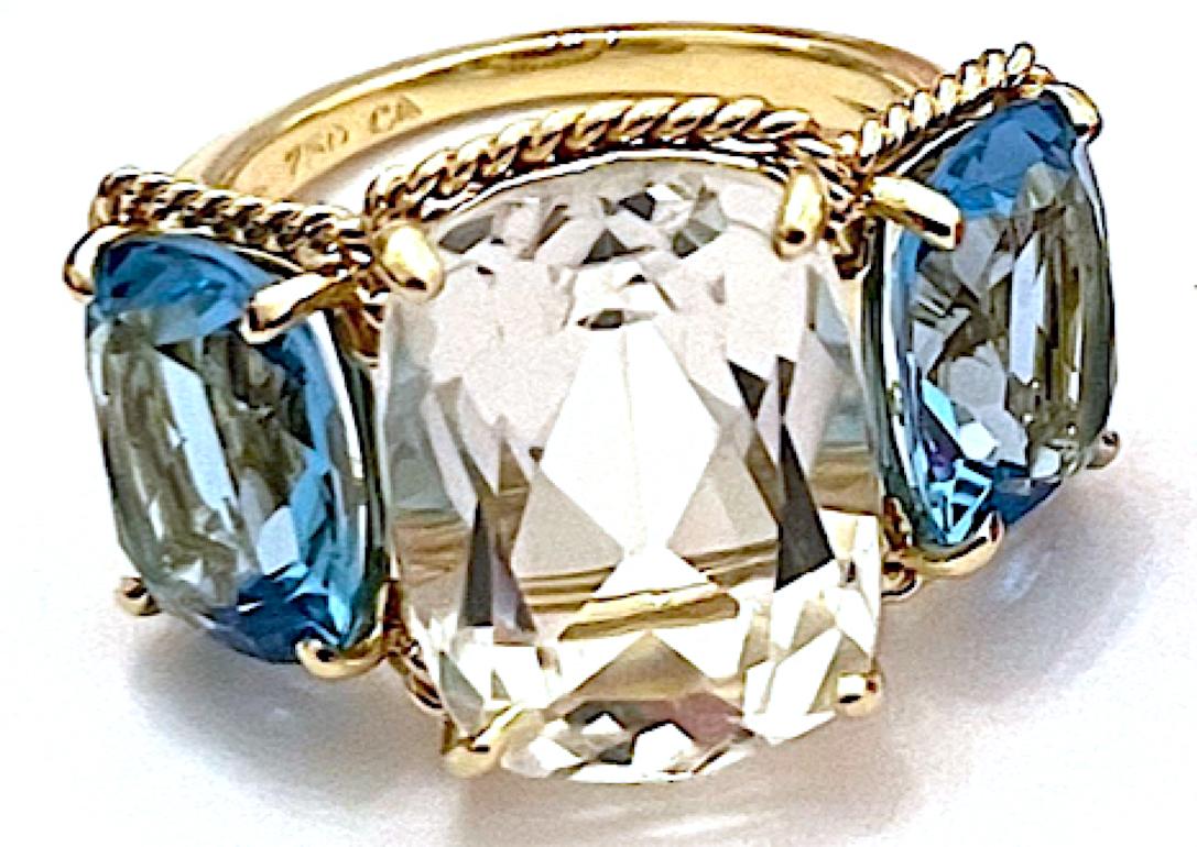 Women's Three Stone Ring with Blue Topaz finished with Rope Twist Border For Sale