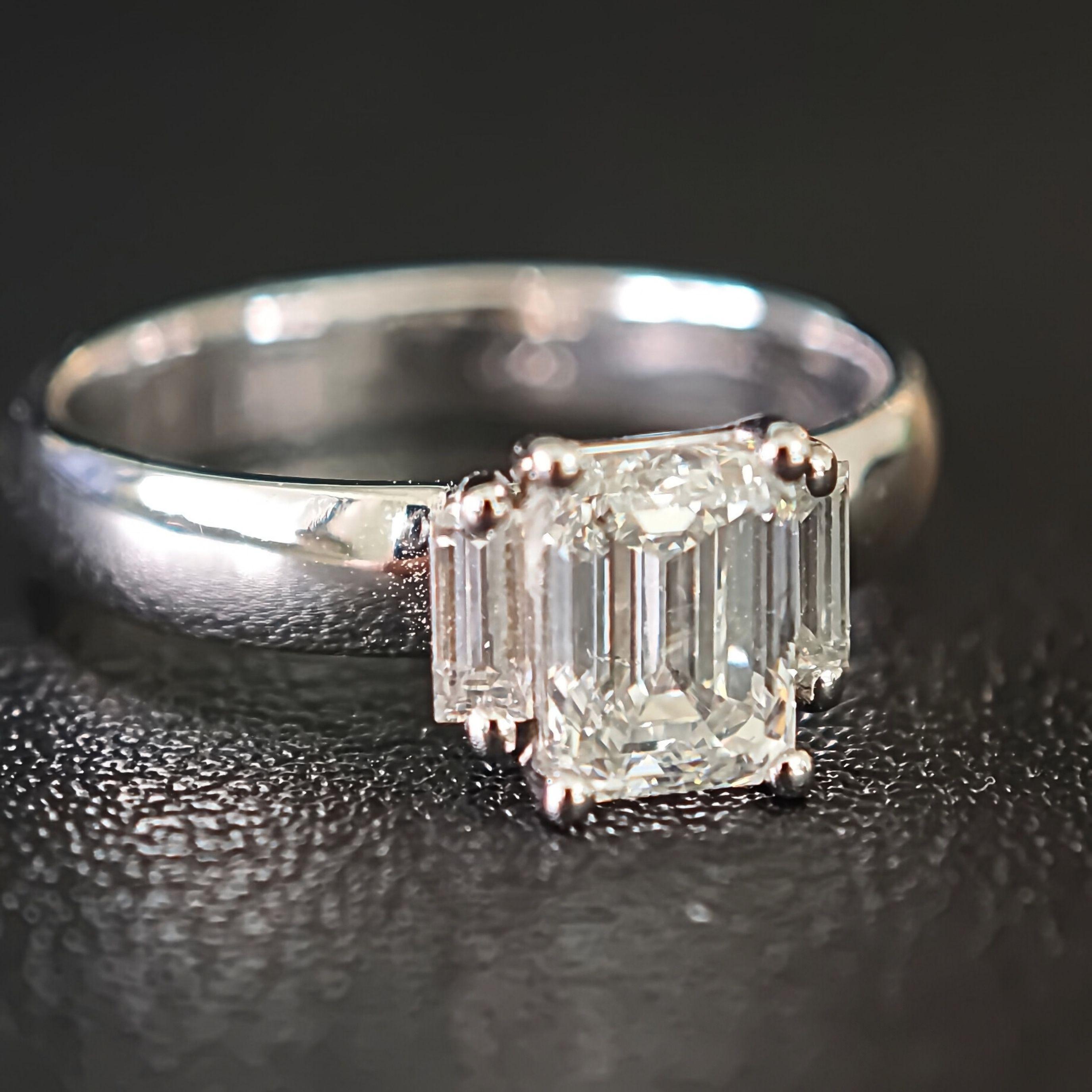 Three-Stone Ring with Emerald Cut Diamond and Tapered Baguette Side ...