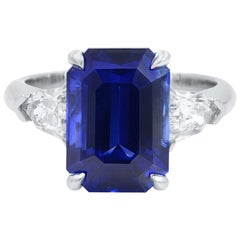 Three-Stone Sapphire 7.03 Carat Engagement Ring 0.84 Carat Bullets Platinum 6.5