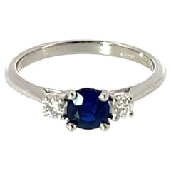 Anello con zaffiro e diamante a tre pietre - Platino