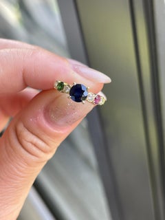 Three stone sapphire emerald ruby ring 18KT yellow gold