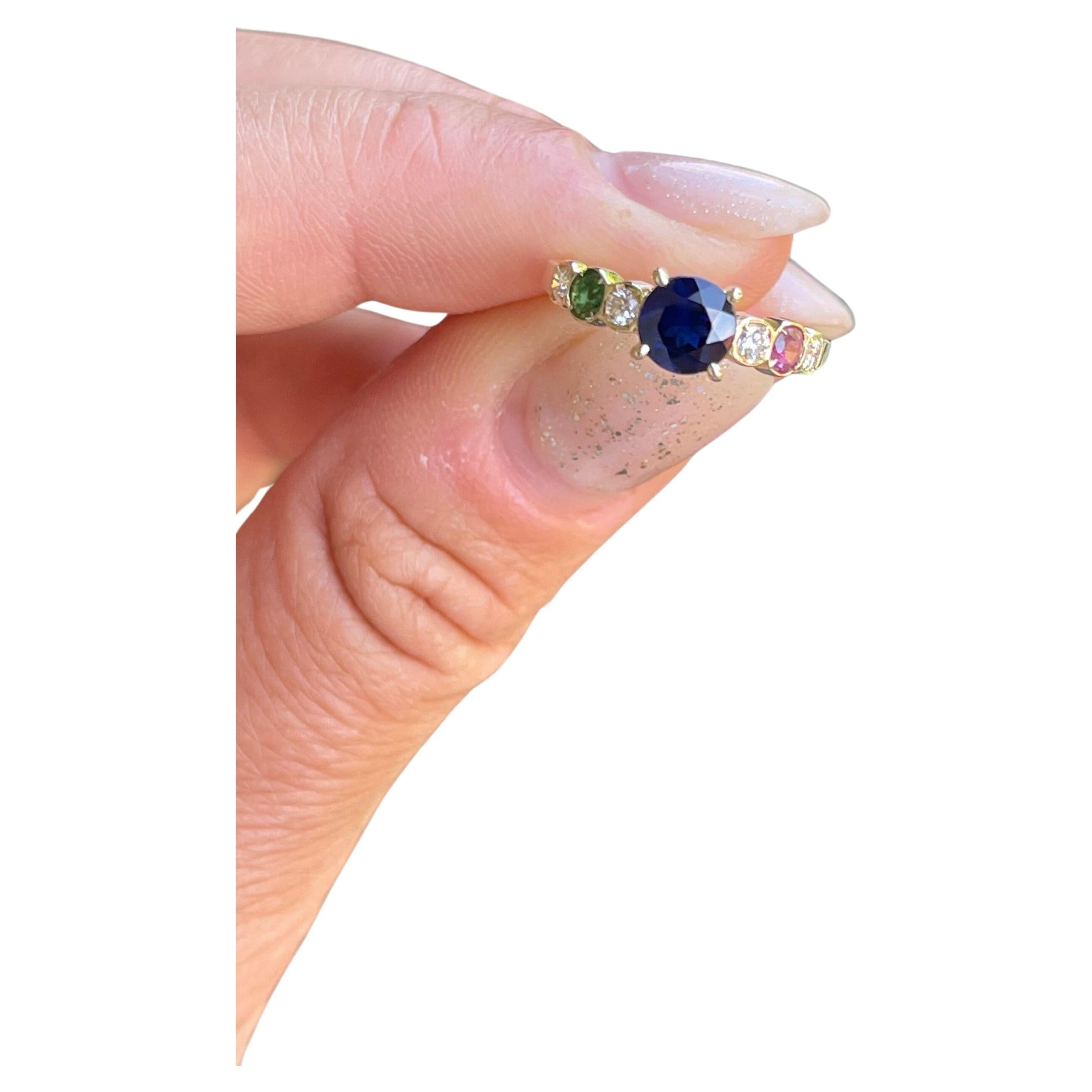 Anillo de tres piedras zafiro esmeralda rubí oro amarillo 18KT