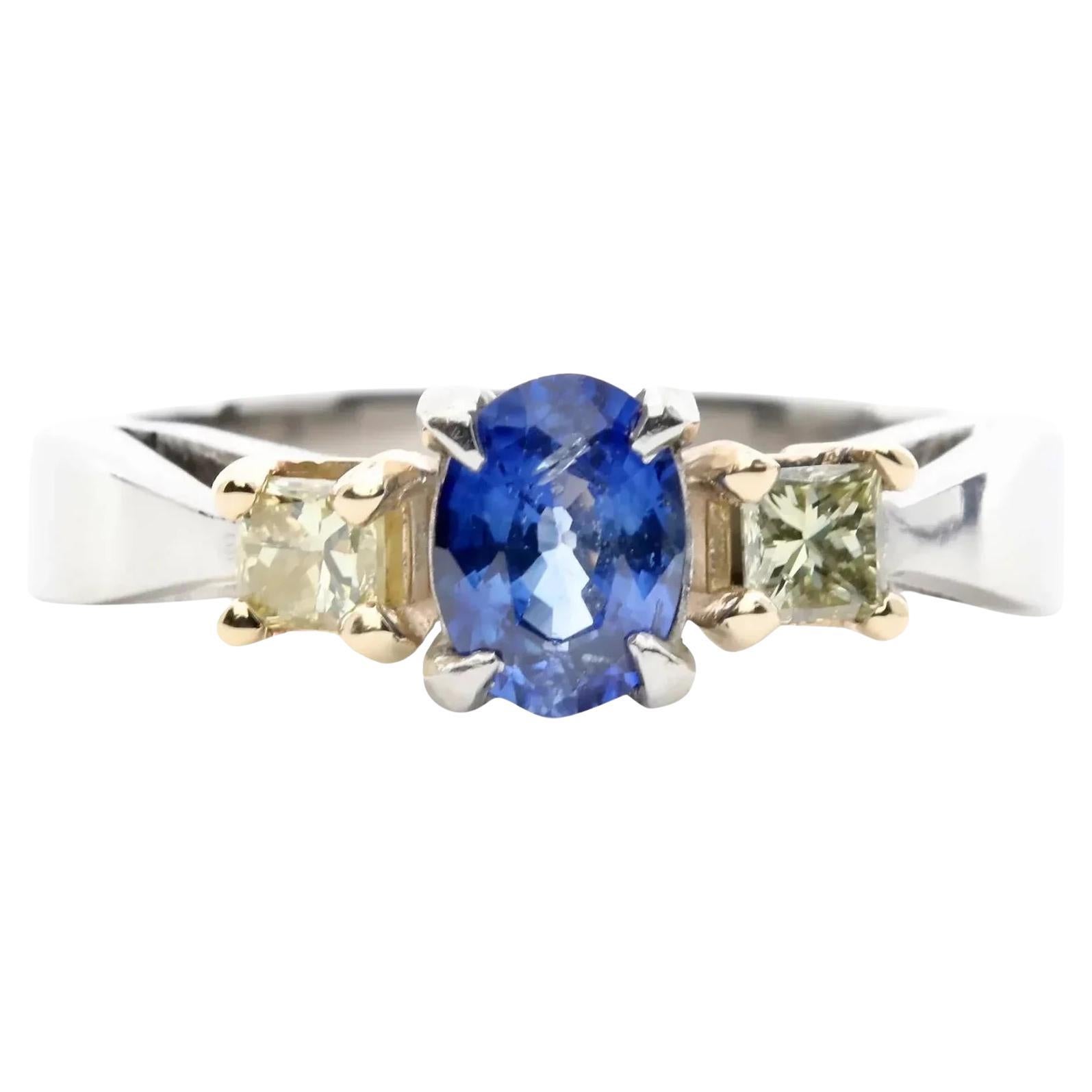 Three Stone Sapphire & Fancy Yellow Diamond Ring in Platinum For Sale
