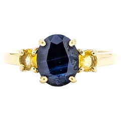 Anello con zaffiro a tre pietre in oro giallo 14k