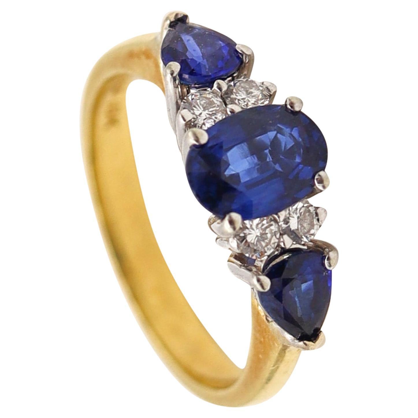 Three Stone Setting Ring In 18Kt Gold With 1.87 Ctw In Sapphires And Diamonds For Sale