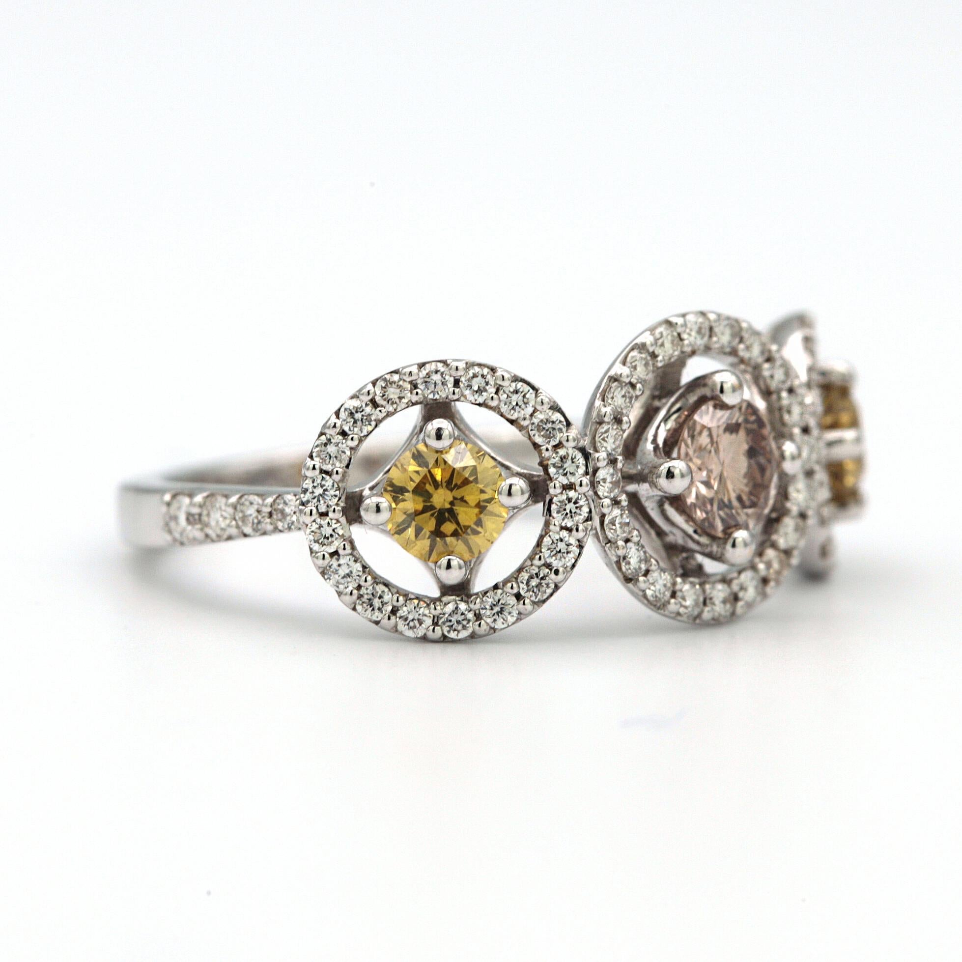 Modern Three-Stone Yellow and Pink Diamond 18 Karat White Gold Ring For Sale