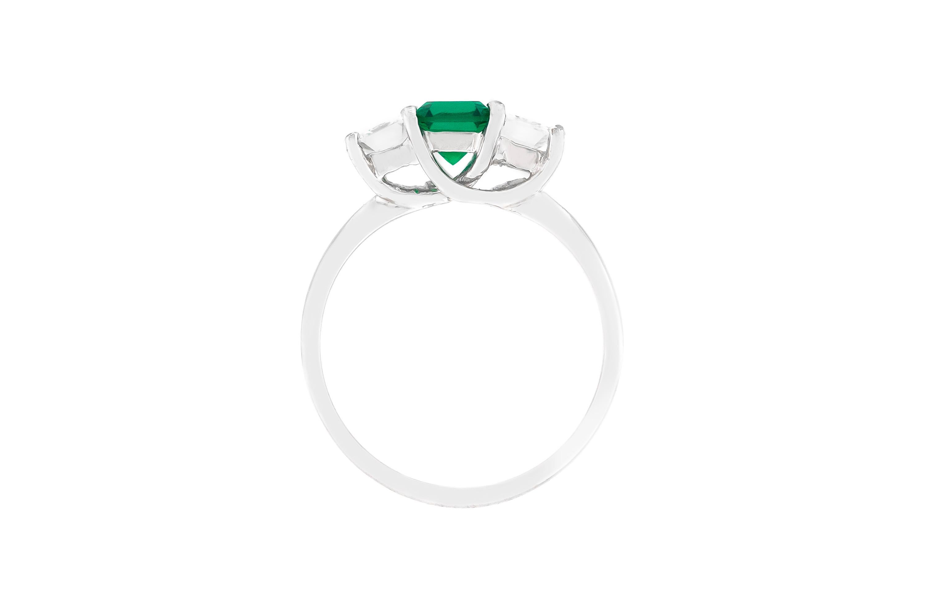 The ring is finely crafted in platinum with center emerald weighing approximately total of 0.68 carat and diamonds weighing approximately total of 0.66 carat.
Circa 2000.
