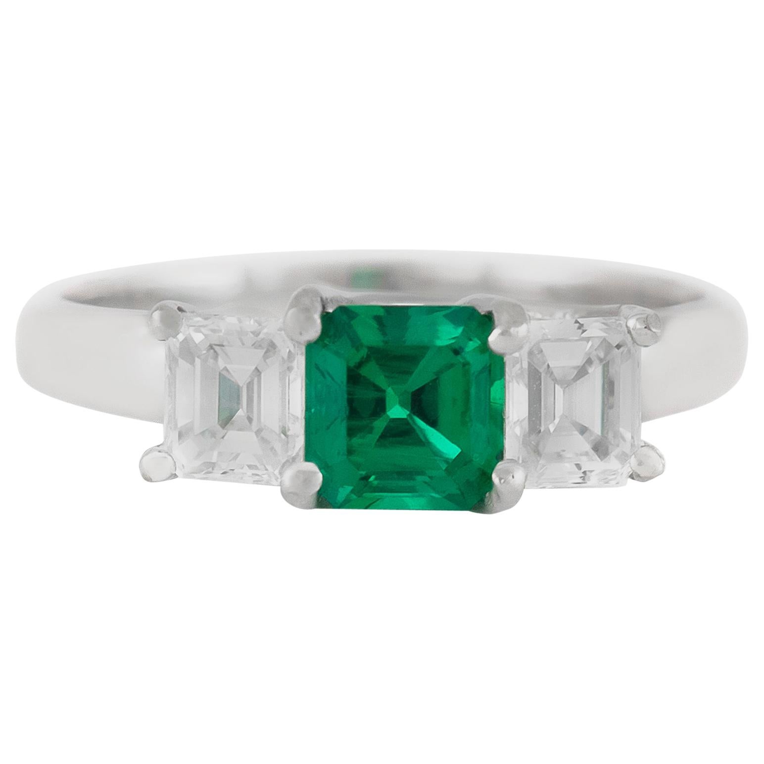 Three Stones with Center Emerald Engagement Ring