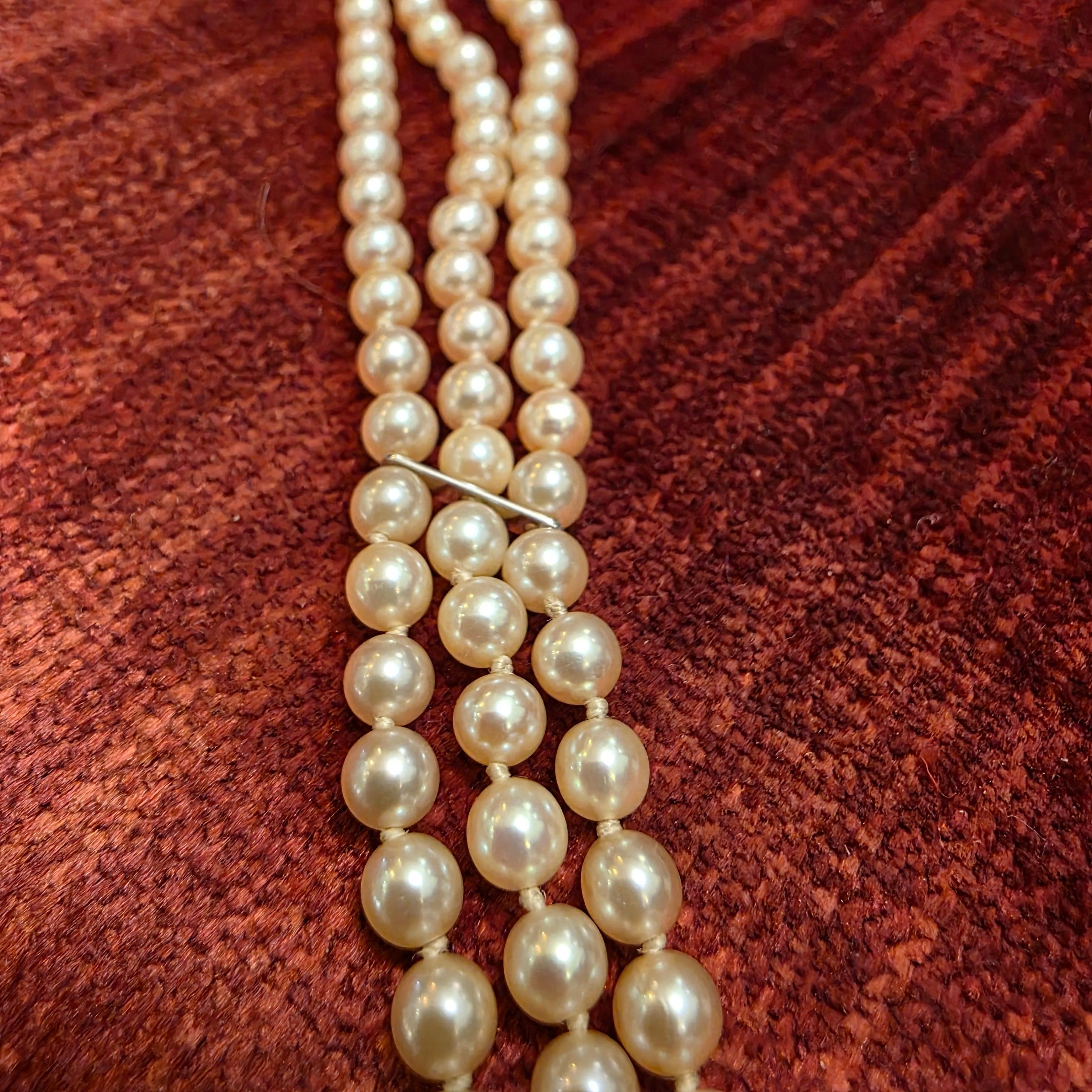 Three-Strand Cultured Akoya Pearl Necklace with Sapphire Clasp, Circa 1930s–40s For Sale 5