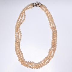 Three-Strand Cultured Akoya Pearl Necklace with Sapphire Clasp, Circa 1930s–40s