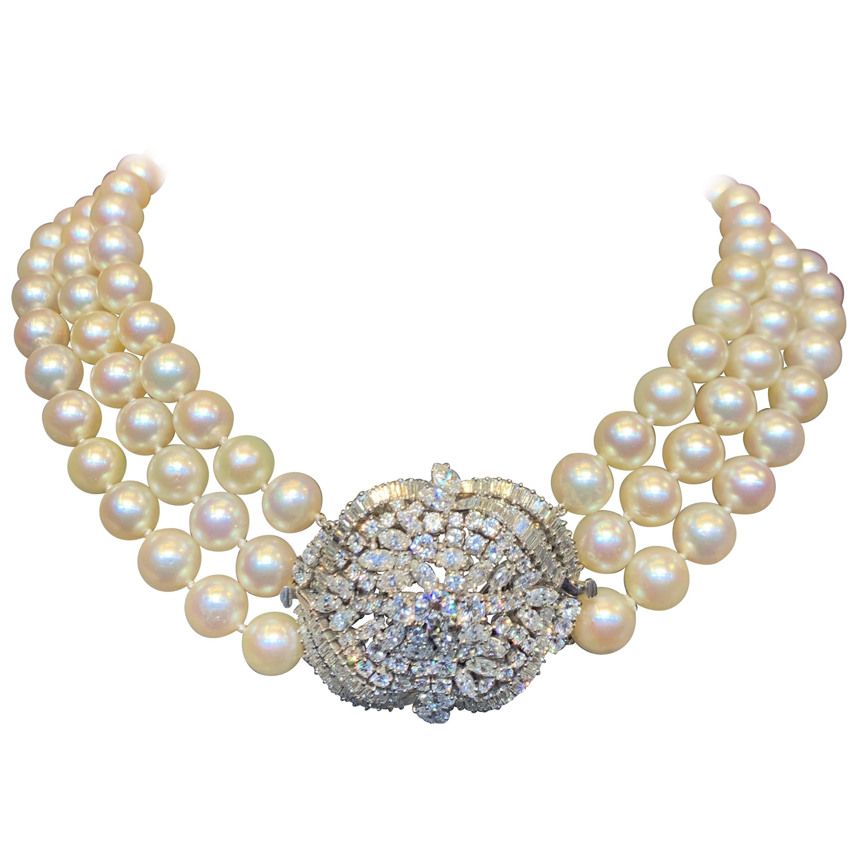 Three Strand Pearl  & Diamond Necklace
162 Diamonds total approximate 10 carats
Center diamond element is convertible to a diamond brooch. 
Measurements: 16.5