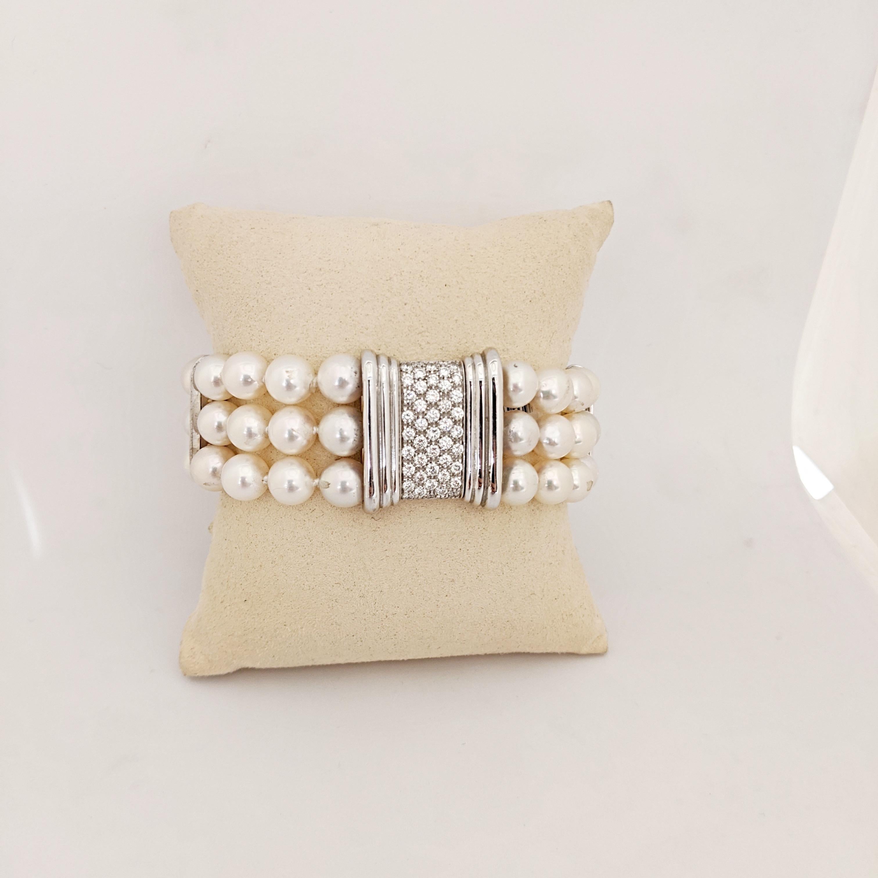 A Pearl bracelet is the all time classic!!
This bracelet is designed with three rows of 8mm Cultured Pearls. The bracelet has 3 White Gold and Diamond bars along with a beautiful clasp that has been set with round brilliant Diamonds. When the clasp