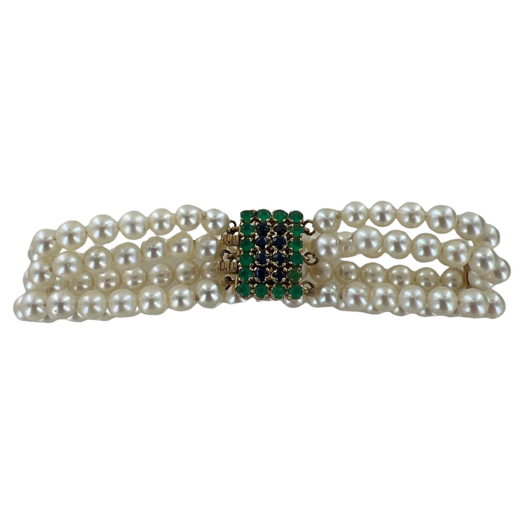 Three Strand White Pearl Bracelet Emerald Sapphire 14 Karat Yellow Gold Clasp 