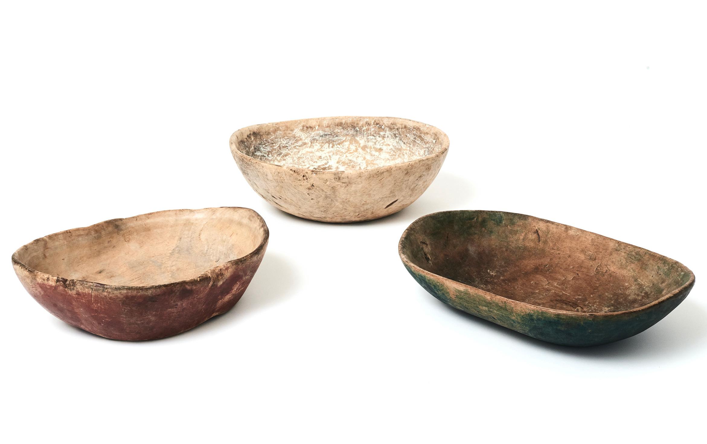 A set of three Swedish freeform carved and painted bowls, 19th century, some with owners initials and dates. Original surfaces. Have not been waxed and have original dry surfaces. Good sizes.
Measurements: Red bowl - 38cm x 28cm x 10cm