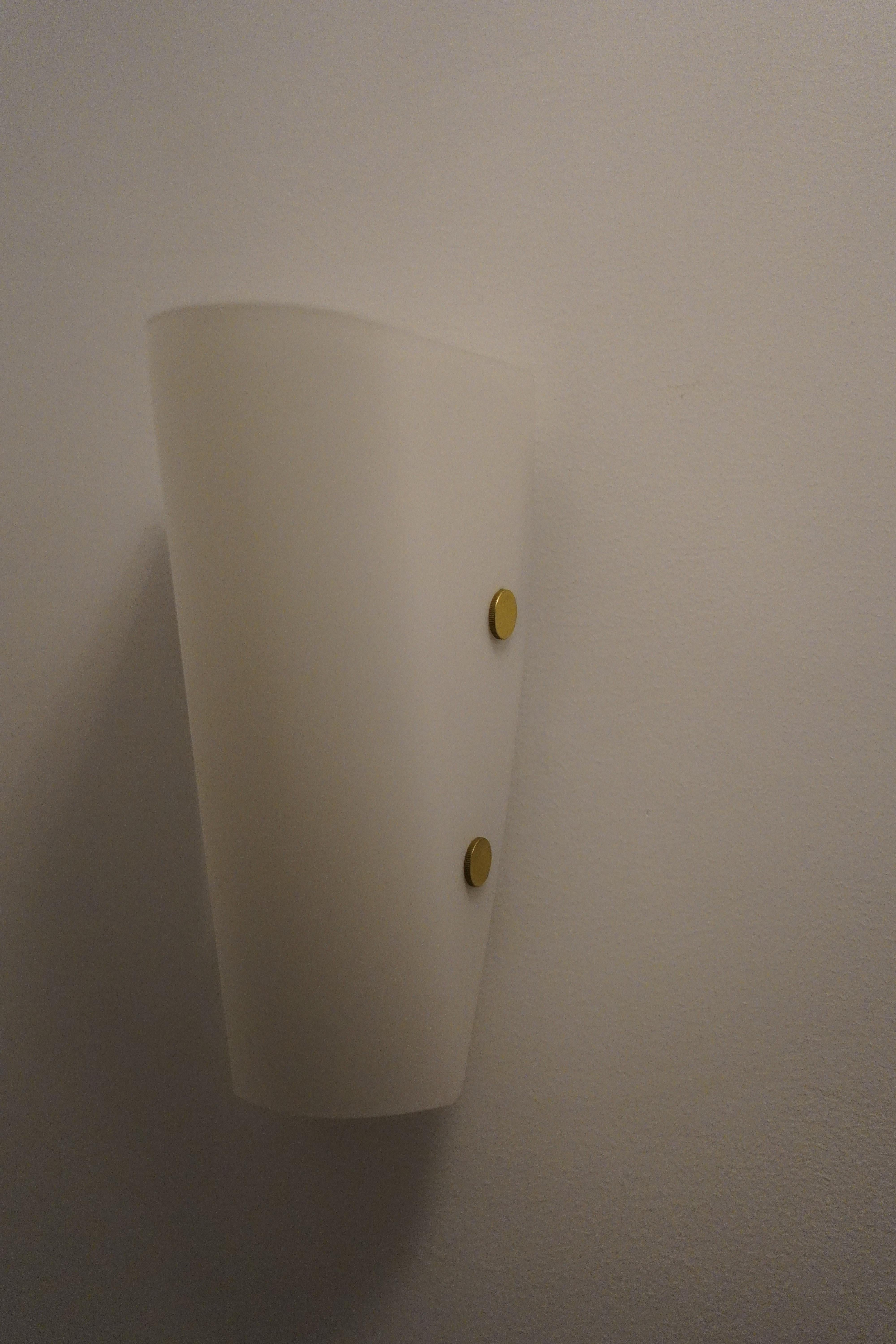 Cast Swedish frosted glass Sconces with brass finials by Nybro, Sweden 1980 For Sale