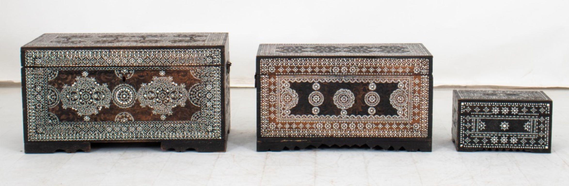 Three Syrian Carved Walnut Chests with bone inlay.  Provenance: From a Manhattan Collection. 

Dealer: S138XX